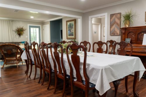 12 Seat Dining Table and Antique Piano